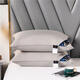 A pair of down pillows for five-star hotels, a white goose down pillow for home use, and a white low pillow