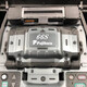 Guangxin Sunac Japan importierte Fujikura FSM-48S+66S+87S+87C+/88S+Faserspleißmaschine Vollautomatisch Sechsmotor-Kabel-Kabel-Kabel-Faser-Spleißmaschine Fujikura 87c+mit CT-16-Schneidmiete