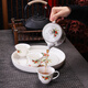 Songhui white porcelain gold-painted Kung Fu tea set with ceramic plate for home use, simple ear-proof anti-scalding teapot, small set, everything goes well (teapot 400ml tea cup 80ml tea tray 25)