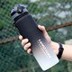 KANGZYUAN Tritan plastic water cup large capacity cup for men and women outdoor sports fitness water bottle student portable military training pot black and white gradient 1000ml