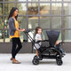 Baby trend two-seater stroller can sit or stand, 22.6kg load capacity, front and rear seat belts