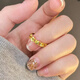 Zhijue's new 999 solid gold four-leaf clover ring 24K gold plain ring pure gold open glossy ring 0.01g four-leaf clover open ring