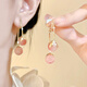 Shufen pierced earrings high-end pink fruit tassel ear clips for women 2025 new light luxury niche mosquito coil disc earrings E3568 pink tomato ear clips
