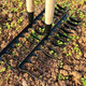 Spiral nail rake manganese steel welded agricultural iron rake multi-functional new gardening quenching rake full set hand-forged German style fourteen-tooth rake single head + 1 point 2m handle