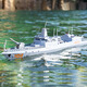 Children's remote control boat toy boy gift aircraft carrier can be launched into the water and launch guns naval military destroyer warship model remote control amphibious assault ship water and power outage single battery version battery life about 30 minutes/gift box packaging/