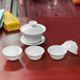 Jiju Xindehua high white porcelain Kung Fu tea set thin simple home office tea set Sancai bowl covered bowl 130ml + 2 teacups + base 3 heads