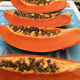 Red papaya, grown in the south for four seasons and bearing annual fruit, potted dwarf Hawaiian red-fleshed fruit papaya (newly planted this year), red papaya seeds, crispy and sweet, 1 pack of approximately 25 seeds