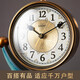 Twelve-eye European-style clock light luxury display clock living room sitting clock desktop pendulum clock table-style ornaments American home table clock blue gold pottery bottom