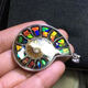 Antique Canadian Ammonite Conch Stone Pendant, around 33 to 38, with Ammonite Stone inlaid in the Conch.