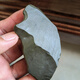 Xinjiang Hami surface green clay jade raw stone hand piece 100 grams, complete appearance and exquisite winding line