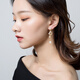 Qlady temperament tassel earrings for women 2024 new temperament high-end imitation pearl earrings light luxury silver needle letter earrings