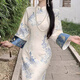 Du Yanzhi 2025 autumn and winter new improved jacquard new Chinese style inverted large sleeves plus velvet thickened cheongsam embroidered long dress for women blue flower porcelain S 95Jin Jin equal to less than 0.5 kg