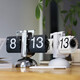 Momen mechanical page-turning clock, automatic page-turning clock, living room clock, retro personalized desktop ornament, table clock, creative ornament, one-legged page-turning clock - all white 21*8*16cm