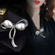 Simple bow brooch for women, high-end corsage for women's neckline, anti-exposure pin, cardigan pin, clothing accessories, gold and silver large bow