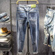 Hualin Modetrendy Herrenhosen Frühling und Sommer hübsch zerrissene Jeans schlank und individuelle elastische Hosen Yiniu 9923 Blau 28