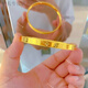 He Jiagong Lao Phoenix 999 gold solid gold four-leaf clover bracelet solid glossy bracelet gold-wrapped silver bracelet for my wife's birthday rice-shaped bracelet same style 56