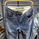 Hualin Modetrendy Herrenhosen Frühling und Sommer hübsch zerrissene Jeans schlank und individuelle elastische Hosen Yiniu 9923 Blau 28