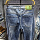 Hualin Modetrendy Herrenhosen Frühling und Sommer hübsch zerrissene Jeans schlank und individuelle elastische Hosen Yiniu 9923 Blau 28