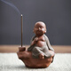 The ancient Zen-like purple sand can raise tea pets, the little monk's tea room decorations, the tea table, the little novice monk's incense, the aromatherapy incense burner decorations, the little purple sand monk gives a short-string incense.