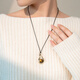 Qlady tiger eye stone water drop necklace women's long high-end light luxury niche 2025 new accessories pendant sweater chain gift