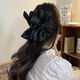 The big bow is very conspicuous_Satin black hair shark clip women's hair clip with multiple hair clips on the back of the head hair clip ins black big bow clip single pack