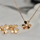 CAOX new light luxury clover necklace full of diamond petals plated 18K gold flower single diamond clavicle chain clover pendant for women