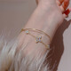 QUAMER's beautiful golden color retro temperament socialite April grass bracelet light luxury niche exquisite bracelet clover zircon bracelet