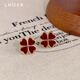 Lnieer red four-leaf clover earrings for women S925 silver needle 2025 new popular earrings niche design high-end earrings four-leaf clover earrings 925 silver needle