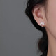 Qi Xiaomi 999 sterling silver flower earrings women's ear piercing small earrings niche 2025 new hot style earrings high-end earrings 999 pure silver flower earrings pair