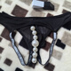 He Jiagong's customized underwear with beads for men, sexy exposed buttocks, thin mesh, 7 large beads, massage back door personalized thong, black, one size fits all, 80-135Jin Jin is equal to 0.5kg