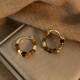 Autumn and winter Maillard retro earrings, popular earrings for women, niche design, high-end earrings for birthday gifts, golden oval imitation tiger eye stone earrings, one pair