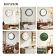 RHYTHM Japanese silent luminous living room large wall clock home light luxury simple fashion wall watch 32cm wall hanging CMG635WR08