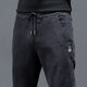 Men's handsome autumn and winter jeans for work, embroidered, high-elastic, warm, wear-resistant, labor protection, casual, straight, youth KXW high-elastic denim trousers 433 Gray 2XL 125-145Jin Jin is equal to 0.5 kg