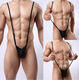 Men's sexy underwear suspender thong can be inserted into the passionate low-waisted temptation thong to expose the buttocks and be gay without taking it off. Black with underwear. One size fits all.