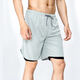 Correr pantalones cortos de maratón dos en uno puede poner teléfonos móviles con deportes de dos capas forradas de baloncesto falso de dos piezas 9904# verde M XL (180C130-145Jin [Jin equivale a 0.5 kg])
