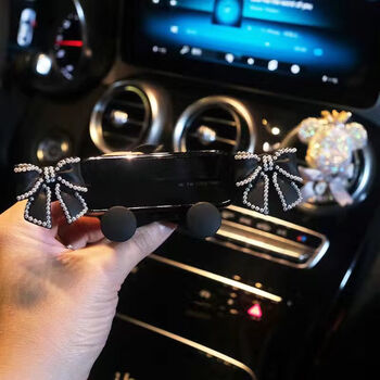 迪彦汽车可爱重力手机支架创意个性可爱卡扣式出风口式车上导航支架女