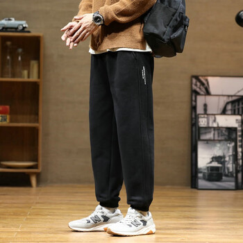 黑色男靓仔个性帅气非主流秋冬裤子 l男生加绒加厚大码休闲运动裤