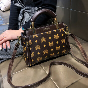 酷奇袋鼠kuqidaishu大牌酷奇真皮包包新款感手提水桶包气质女士斜挎单