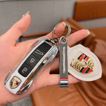 钥匙壳新卡宴taycan9111帕拉梅拉718保时捷macan白色拼银金属银条白盾