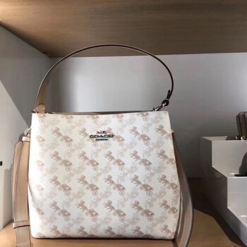 coach/蔻驰女包水桶包马车经典老花白色马车手提单肩斜挎包流浪包