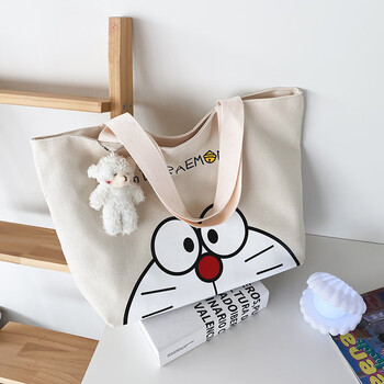 古仕龙哆啦a梦帆布袋卡通可爱大容量女机器猫手提袋学生单肩包白色带