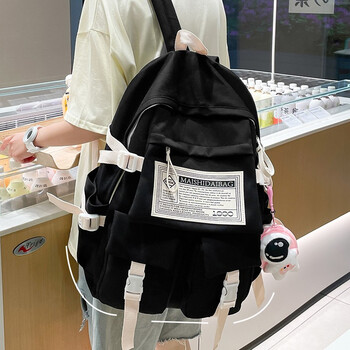 疆誉 书包女初中生韩版高中生大容量日系潮流简约双肩包男大学生ins潮酷中学生防水轻便百搭设计感背包 黑色【带零钱包】