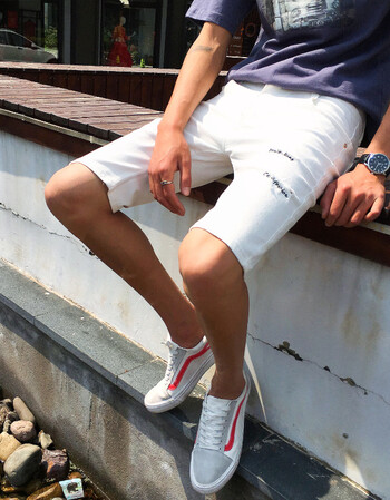 普戈斯(pugesi)2018夏男裤港风街拍青少年时尚修身牛仔裤潮男短裤