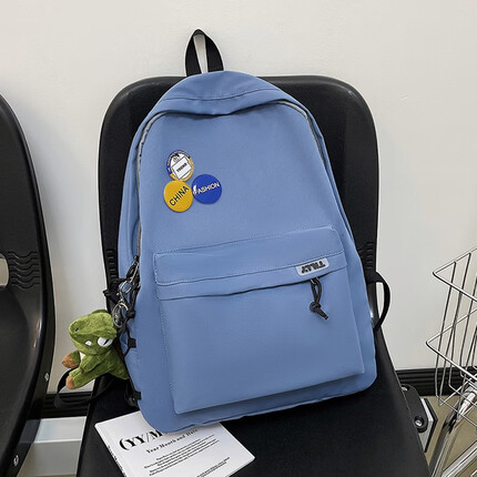 游乐者双肩包男士大容量简约旅行电脑背包女休闲高中大学生初中生书包男 蓝色+徽章+大眼恐龙