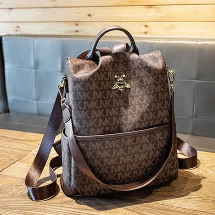 摩登密码包包女轻便双肩包大容量防盗包 咖啡色