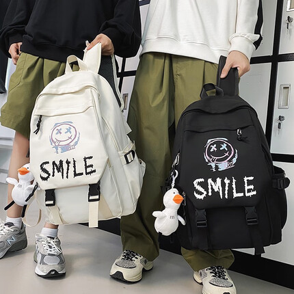 丛林鸟（JUNGLE BIRD）书包男小学生高中学生初中生背包女生新款时尚潮流大容量双肩包 黑色笑脸【加油鸭】