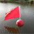 ABS塑料浮球双耳圆型水上航道隔离拦污警示龙舟赛遁划分浮标定制 红色球径 25cm红旗警示球