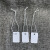 现货PVC塑料防水空白弹力绳价格吊卡标价签100套 PVC白色弹力绳2X3吊牌=100套