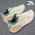 安踏C37+跑步鞋男冬季透气舒适跳绳鞋男士休闲运动鞋 浅米白/远足绿 40.5