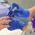 爱马斯一次性丁腈橡胶手套加厚耐用级餐饮防滑耐油实验室防护 [加厚绿丁]GWGNHD 单只6.5克 1 M